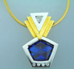 13 ct. shield cut tanzanite pendant - platinum and 18k gold with diamonds